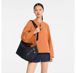 Sac bandoulière Longchamp Le Pliage Collection 10343HSR 001, couleur Noir porté