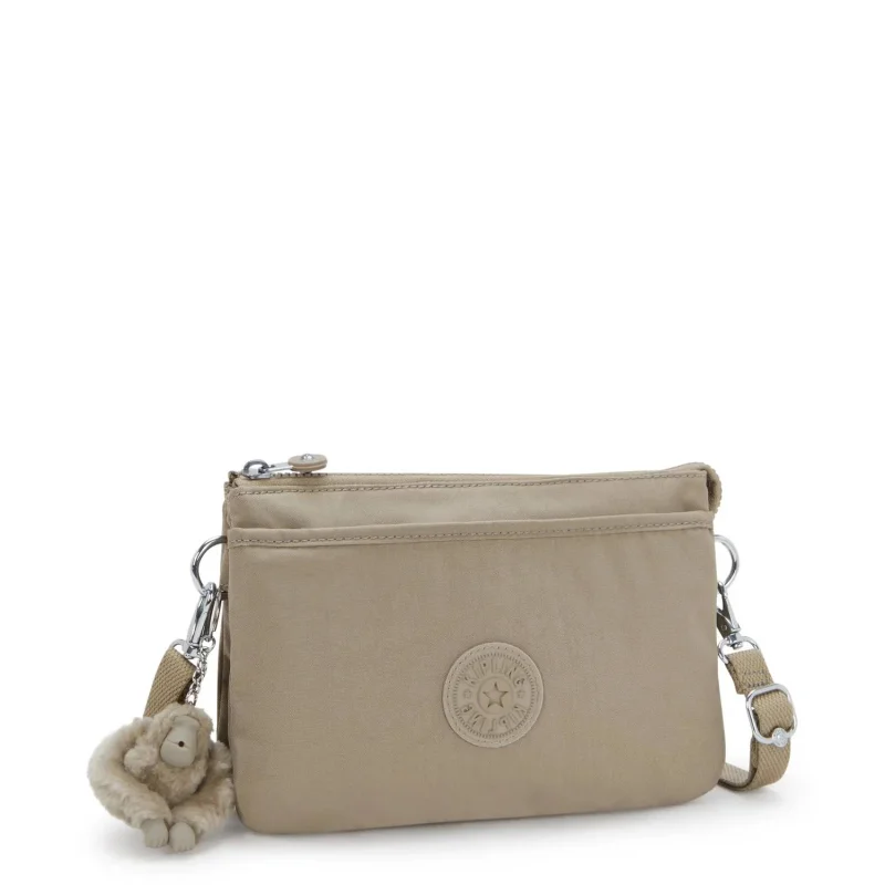 Petit Sac Bandoulière Kipling avec porte clé Riri KPKI75904PW1, couleur Soft Taupe, vue de profil Petit Sac Bandoulière Kipling avec porte clé Riri KPKI75904PW1, couleur Soft Taupe, vue de profil