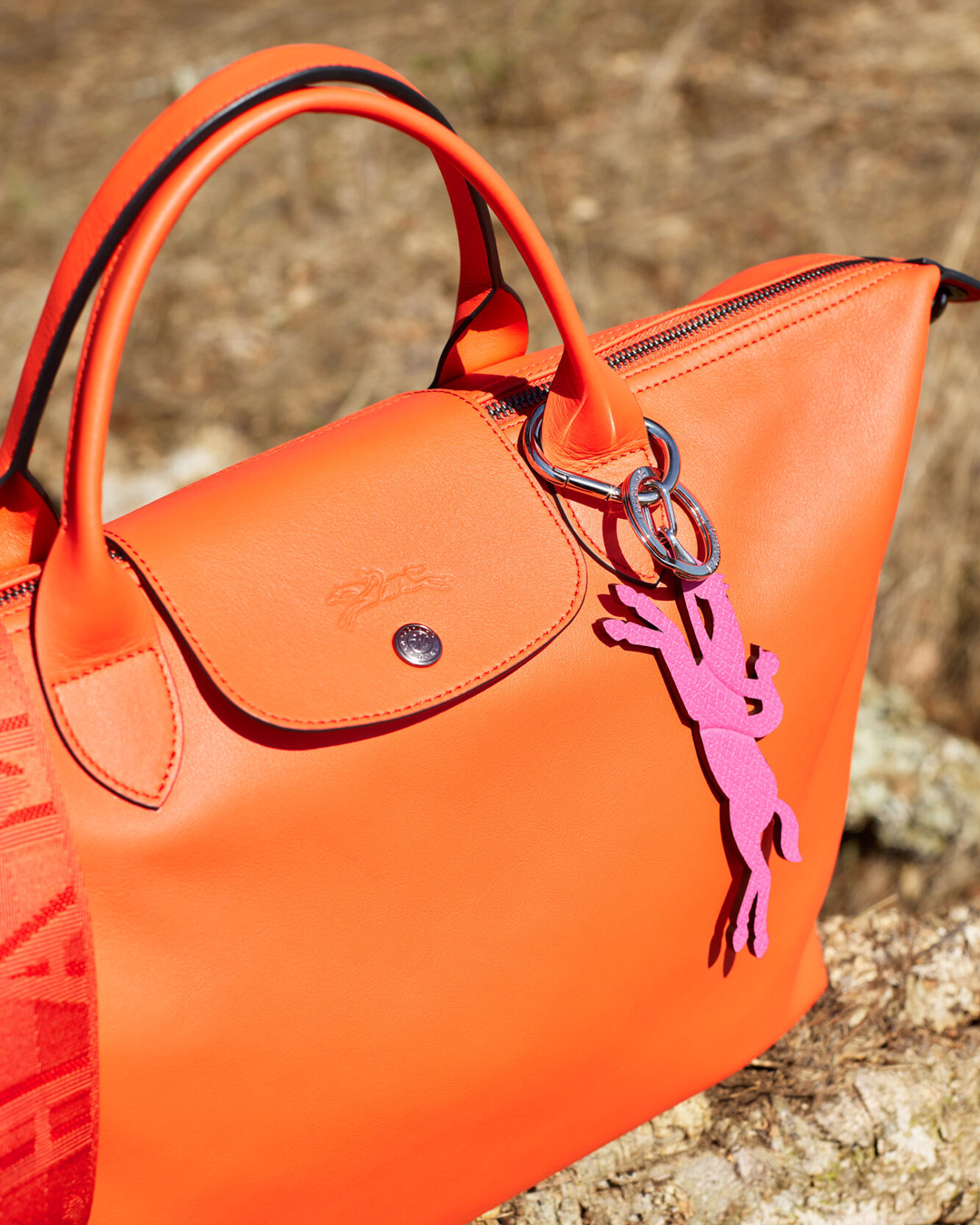 Plier un sac Longchamp le Pliage